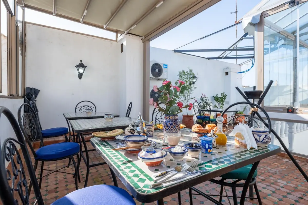 Breakfast laid on the roof terrace under the awning