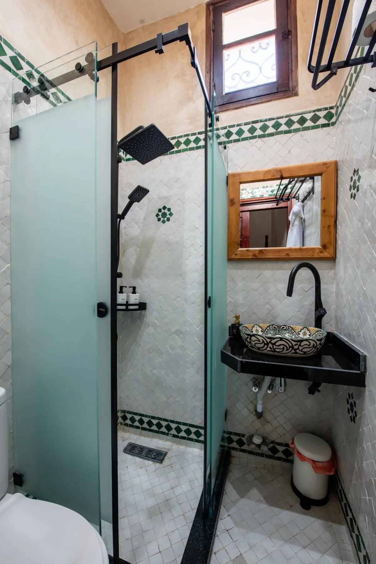 Single room shower room with glass shower